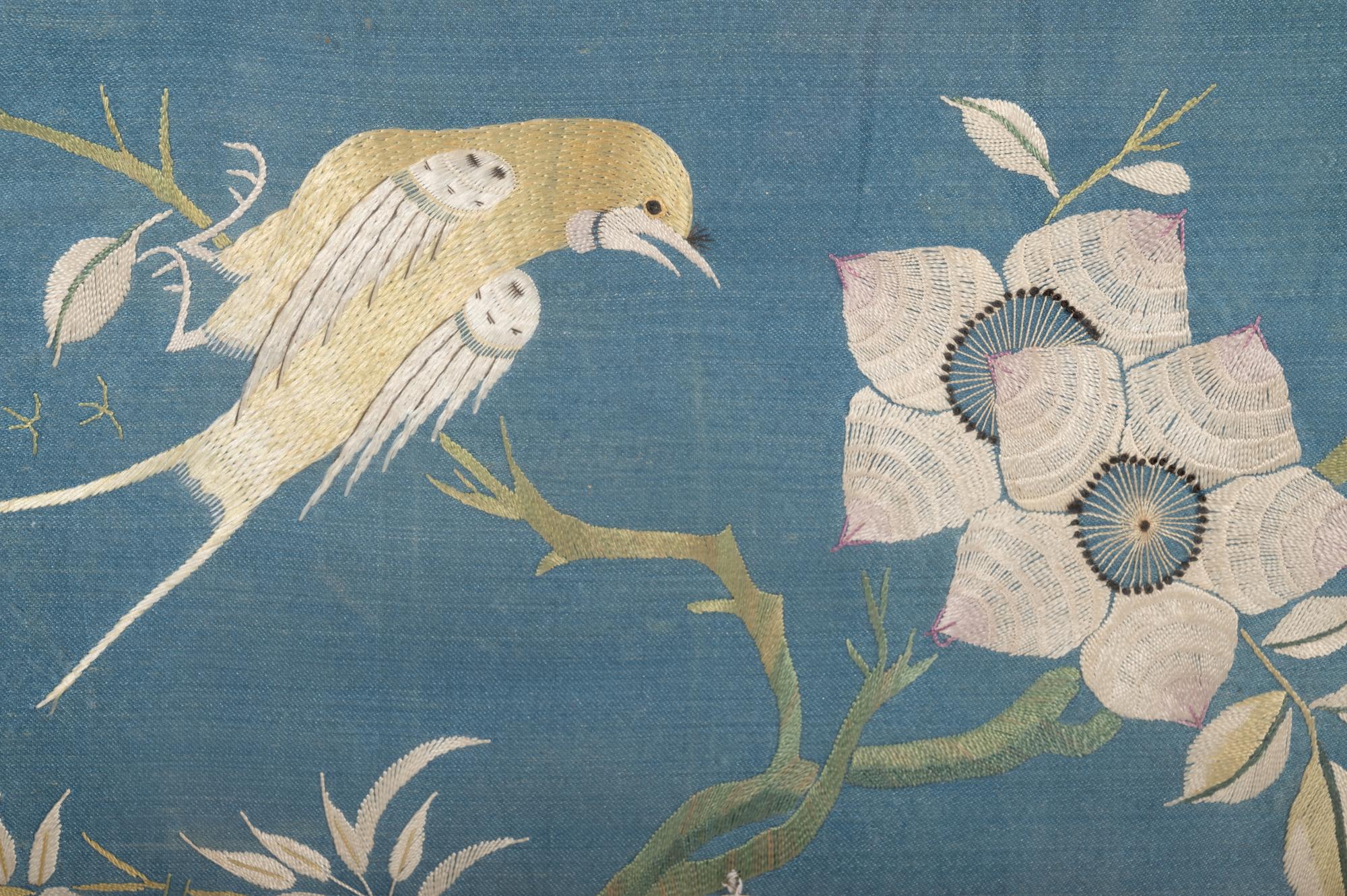 A Pair of Chinese Blue Ground Embroidered Silk 'Bird' Panels