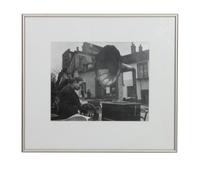 Robert Doisneau, (French, 1912-1994), Man with Phonograph, at Flea Market Paris