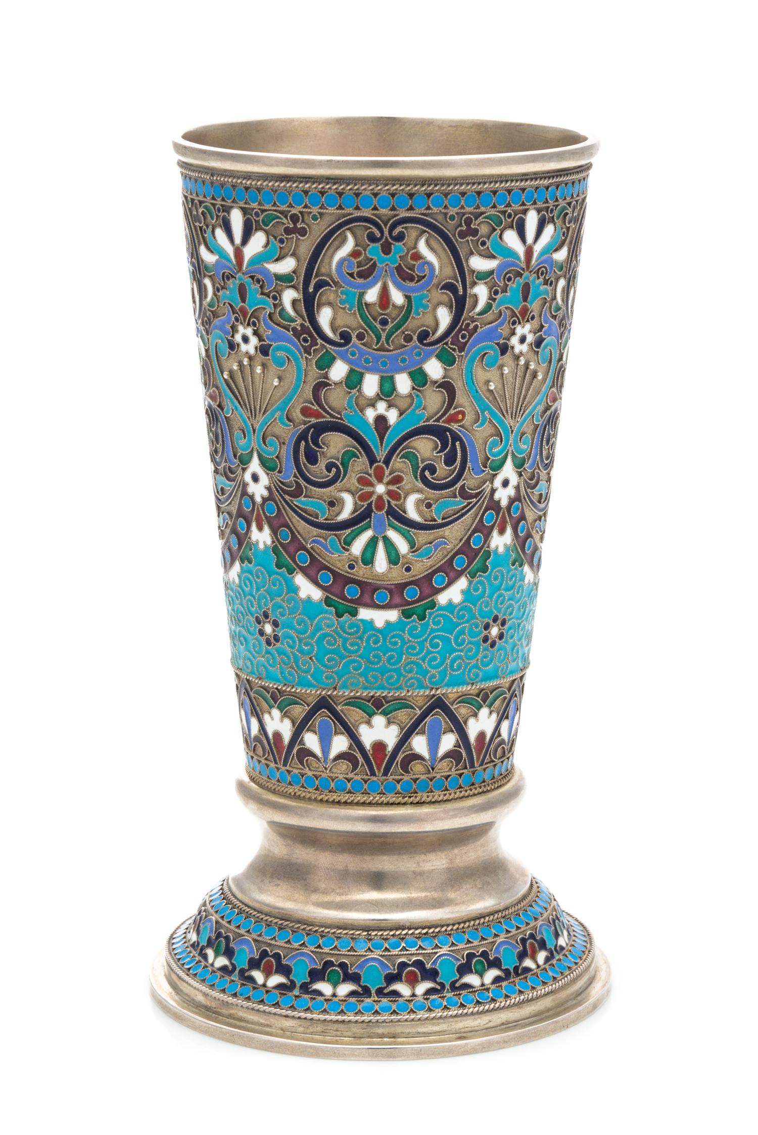 A Russian Enameled Silver Beaker, Mark of Ivan Gubkin, Assay of Vasily Petrov, Moscow, 1884, the tapering body with polychrome floral a