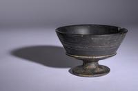 An Etruscan Bucchero Footed Cup