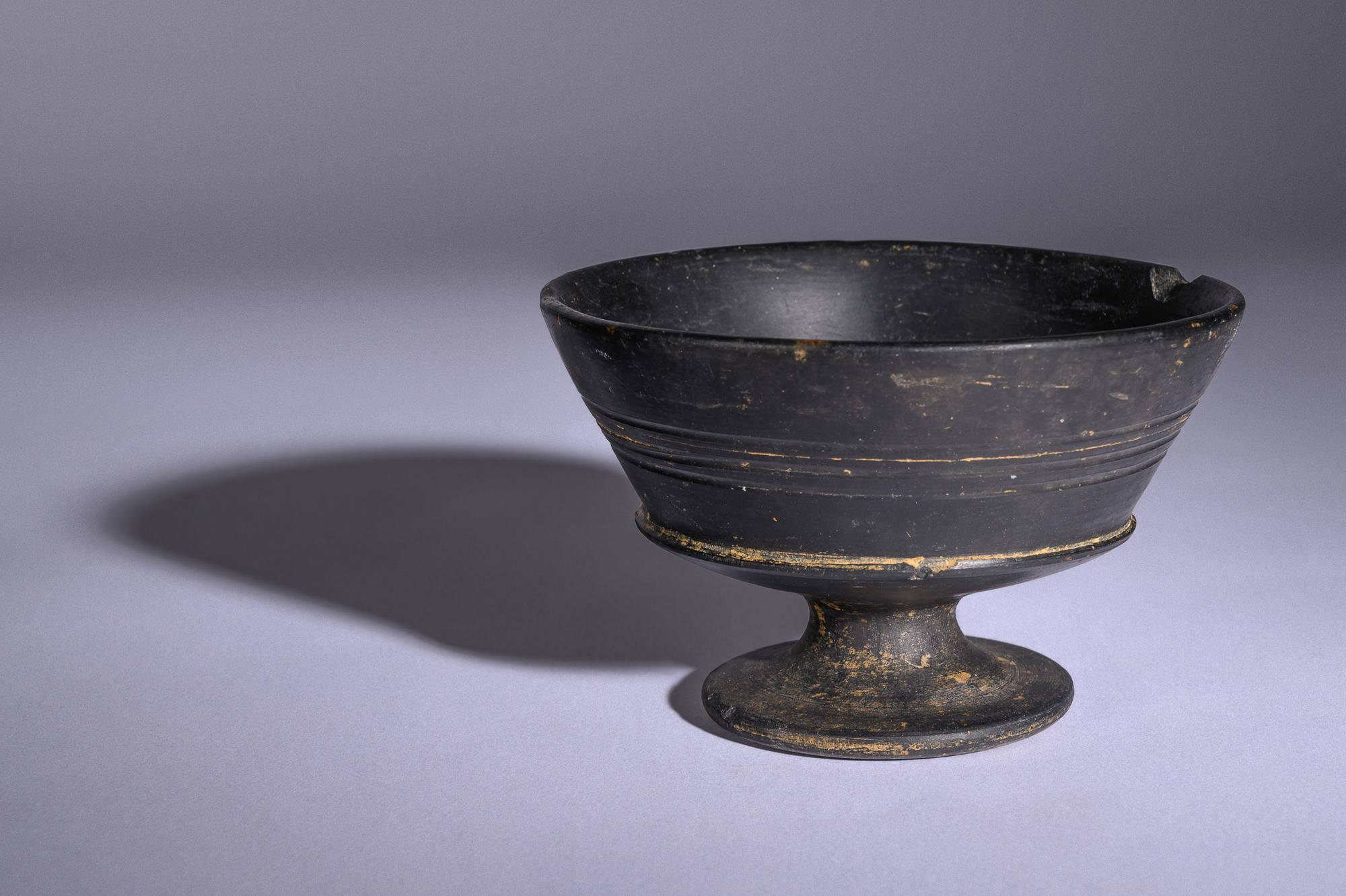 An Etruscan Bucchero Footed Cup