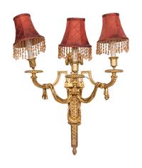 A Set of Four Louis XVI Style Gilt-Bronze Three-Light Sconces
