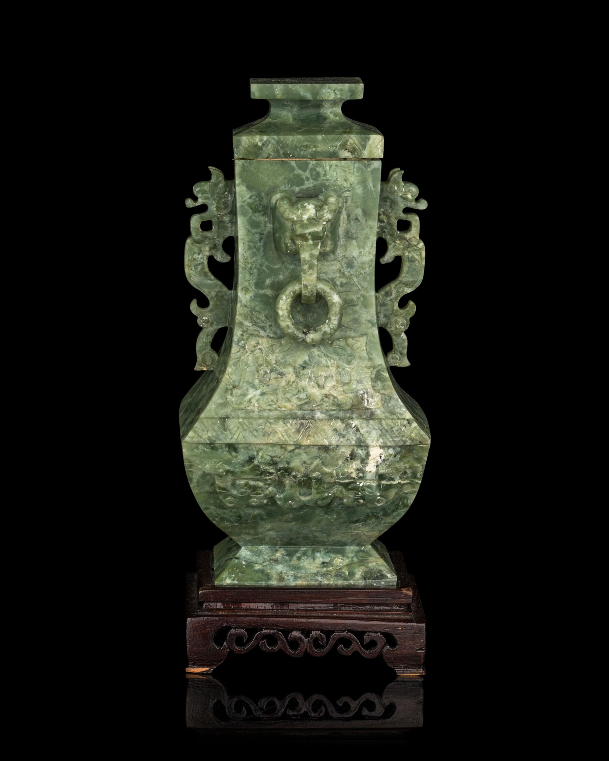 A Chinese Archaistic Green Hardstone Vase and Cover