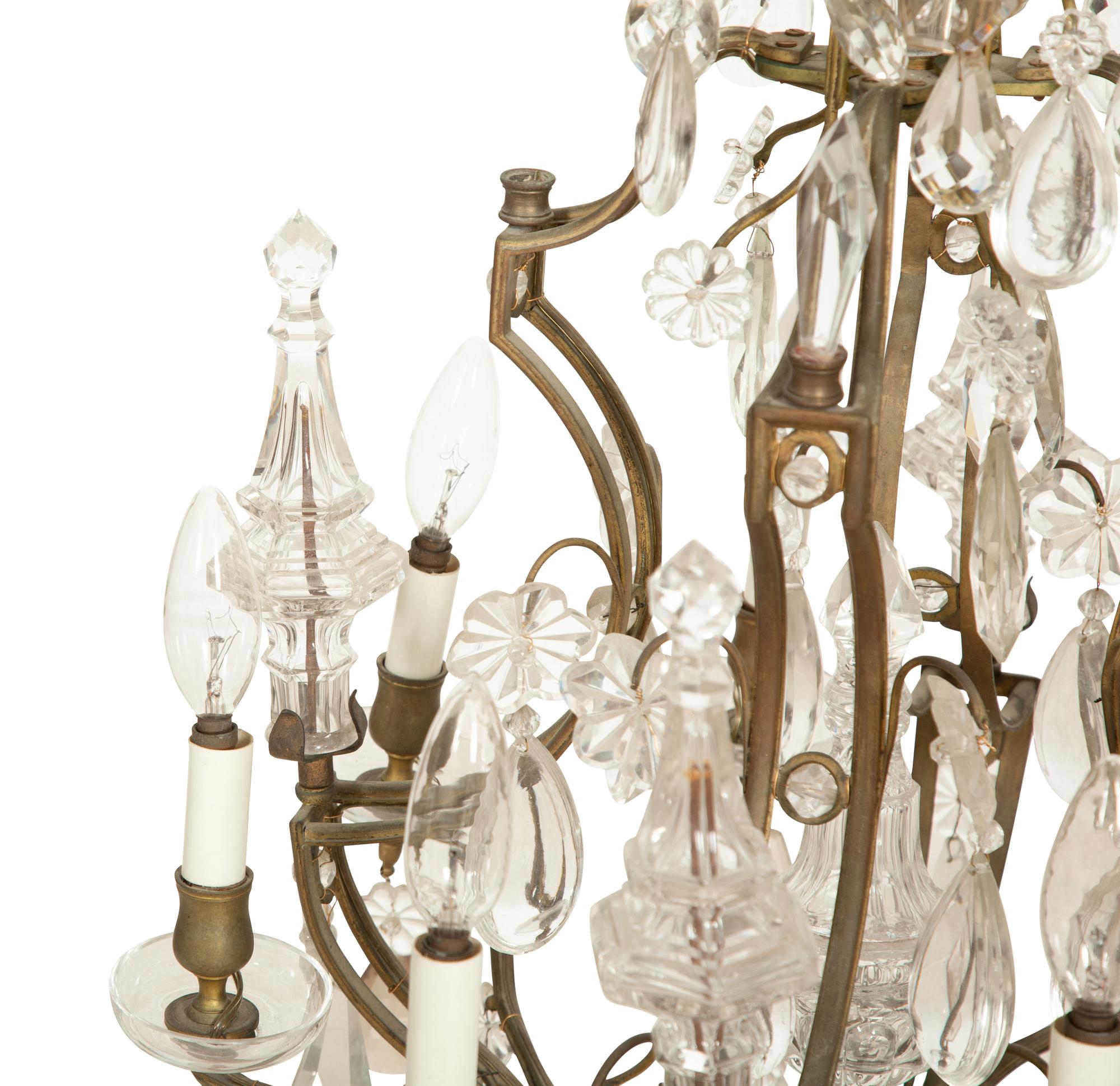 A Louis XV Style Gilt Bronze and Cut Glass Eight-Light Chandelier
