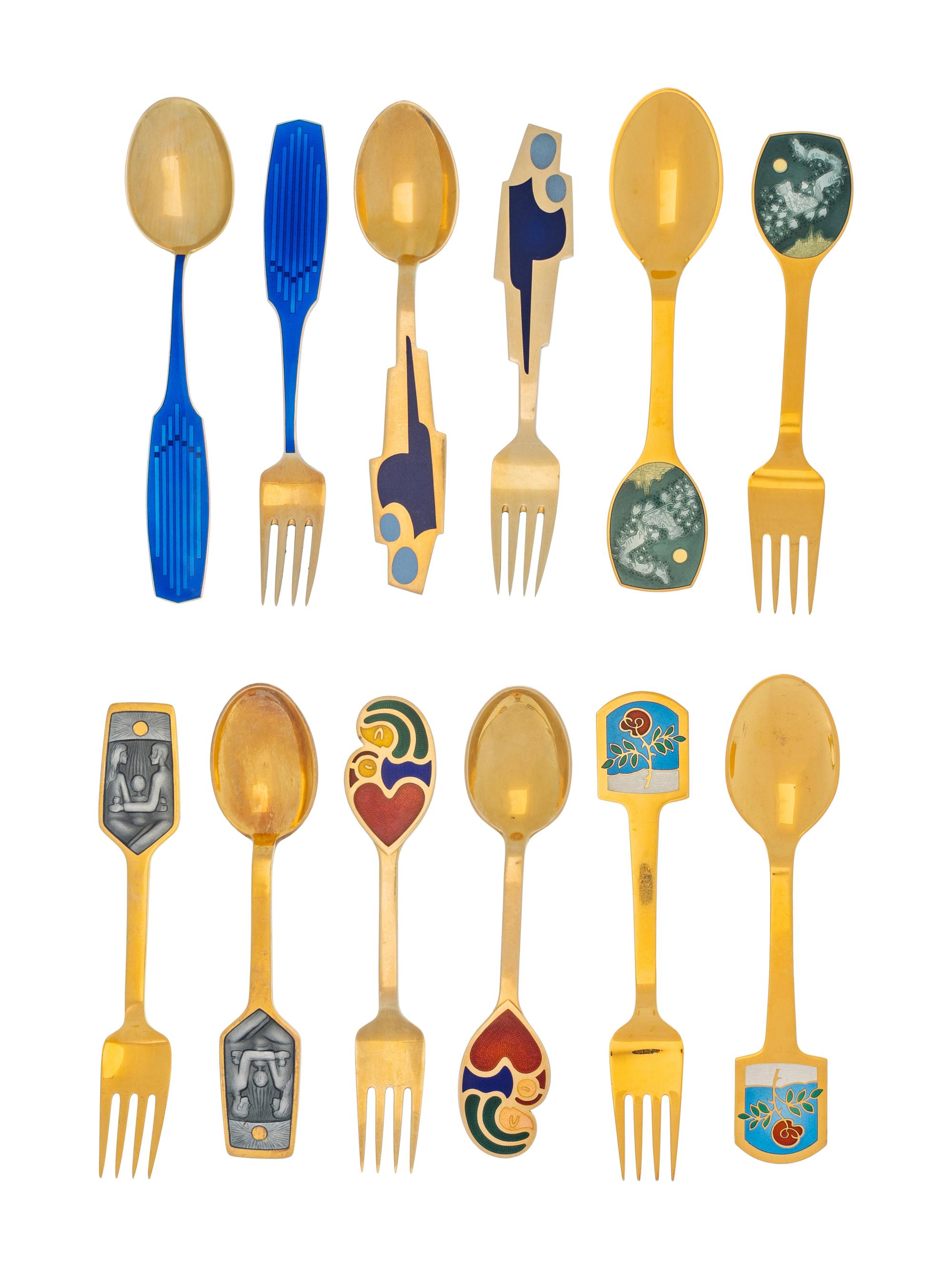 A Collection of Danish Silver-Gilt Christmas Fork and Spoon Sets
