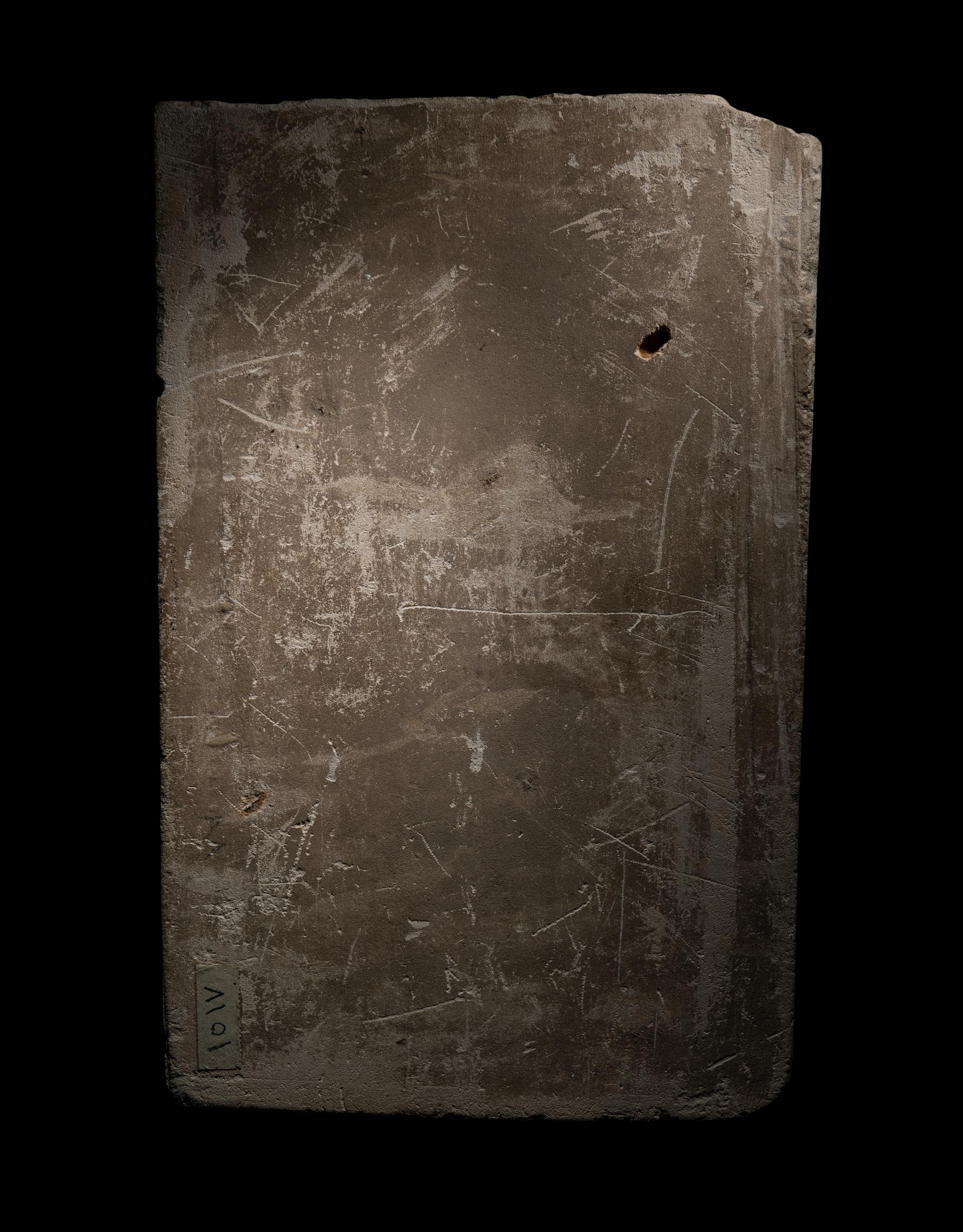 An Egyptian Limestone Relief Fragment with Amun-Re