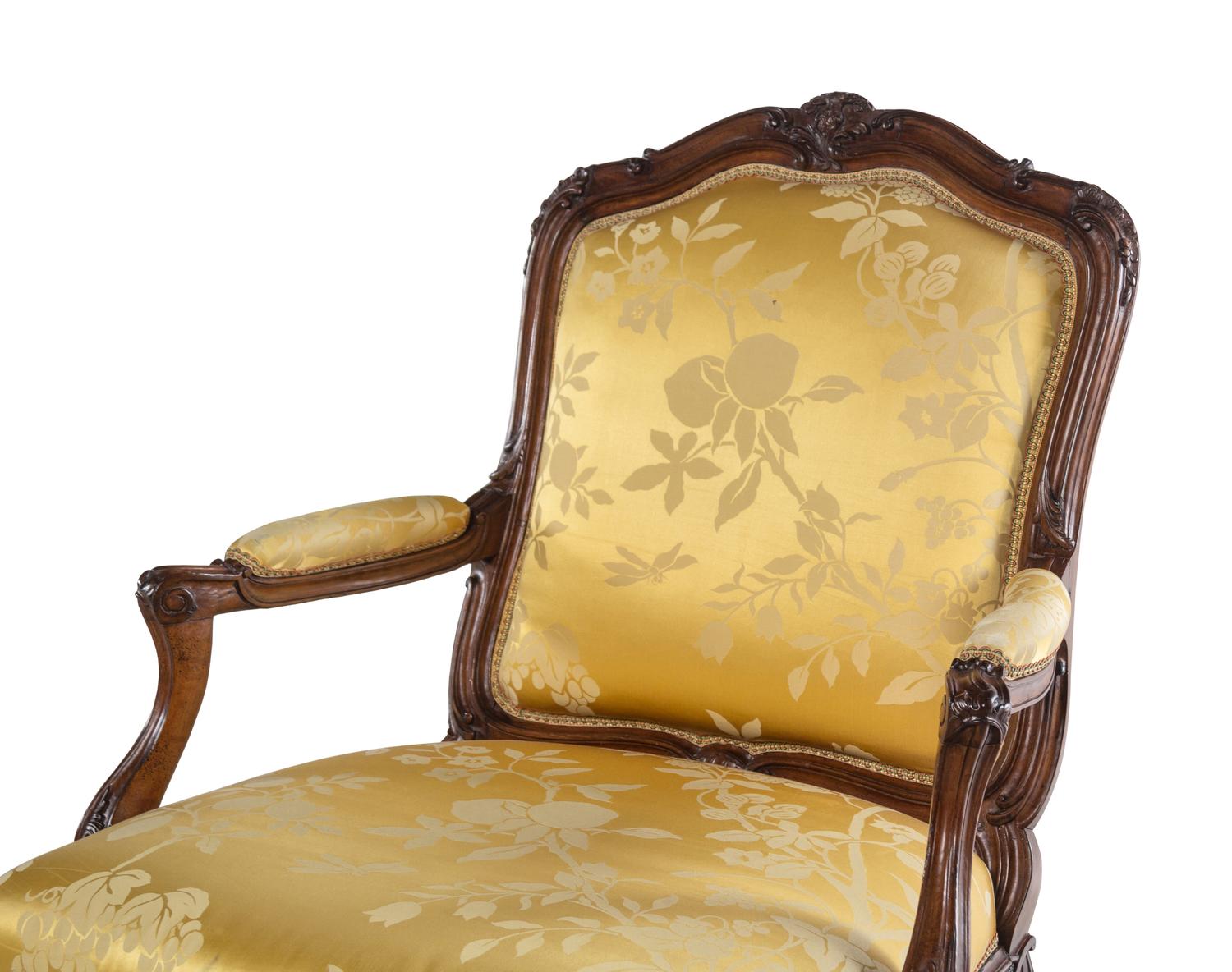 A Set of Four Louis XV Style Walnut Fauteuils