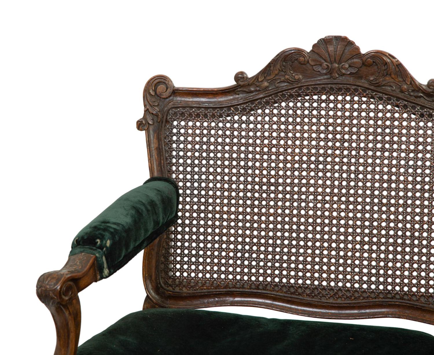 A Régence Style Carved Walnut Triple Chair-Back Settee