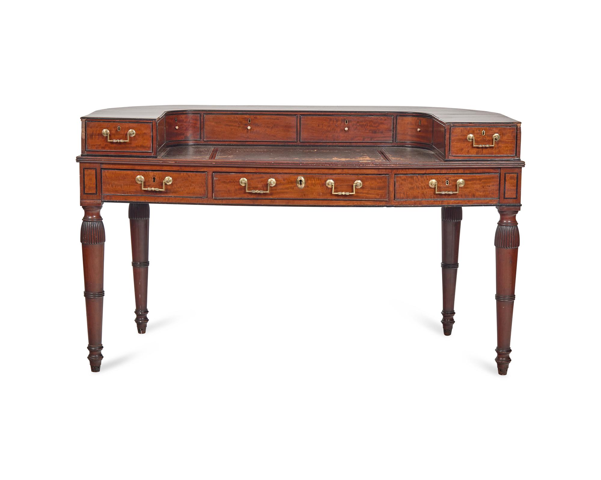 An English Satinwood, Mahogany and Parcel-Ebonized Carlton House Desk Once Owned by William Vincent Astor (1891-1959)