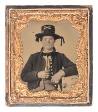[CIVIL WAR]. Sixth plate ruby ambrotype of a young Union cavalryman from the western theater.