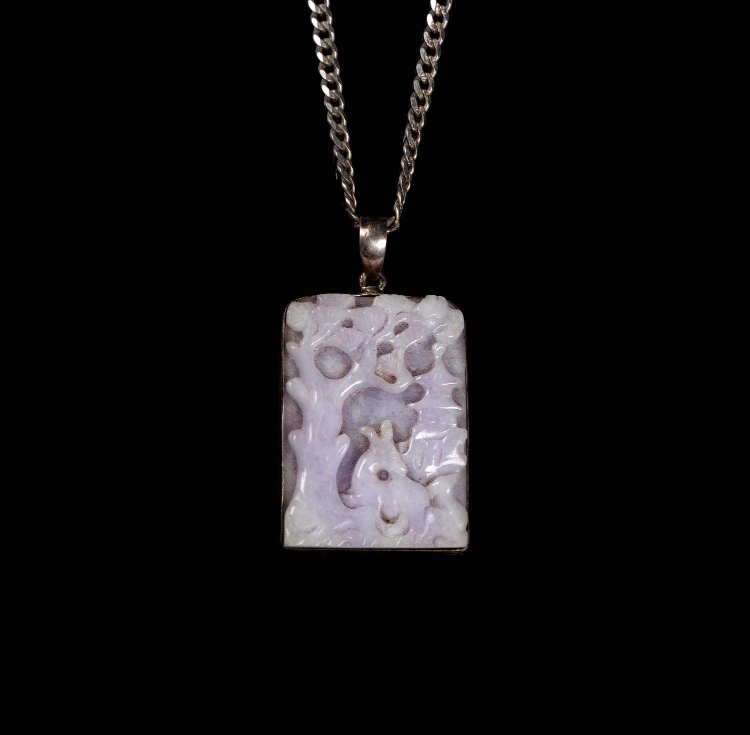 A Chinese Lavender Jadeite and Silver Necklace