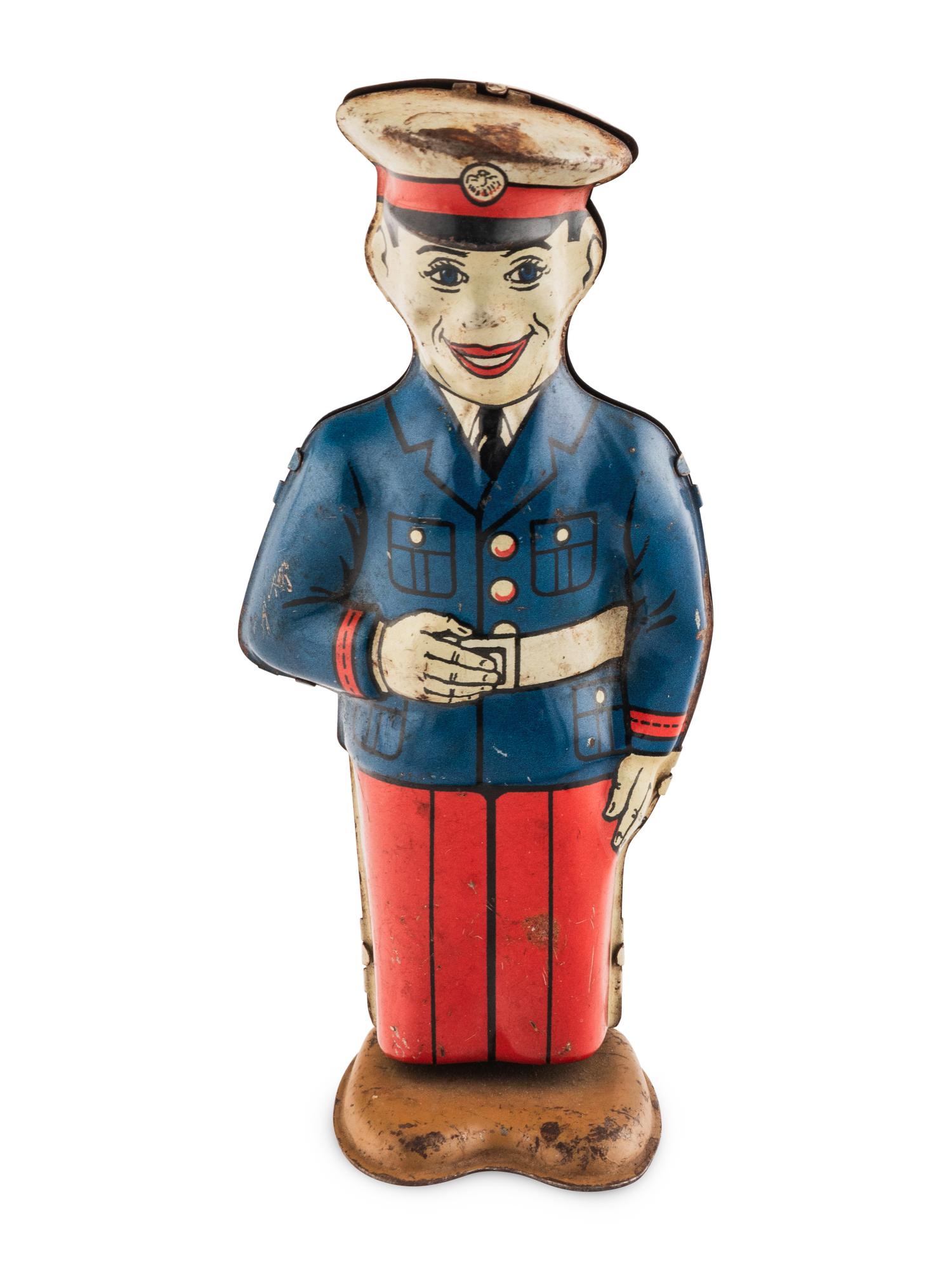 A Group of Three Tin Lithograph Walker Toys