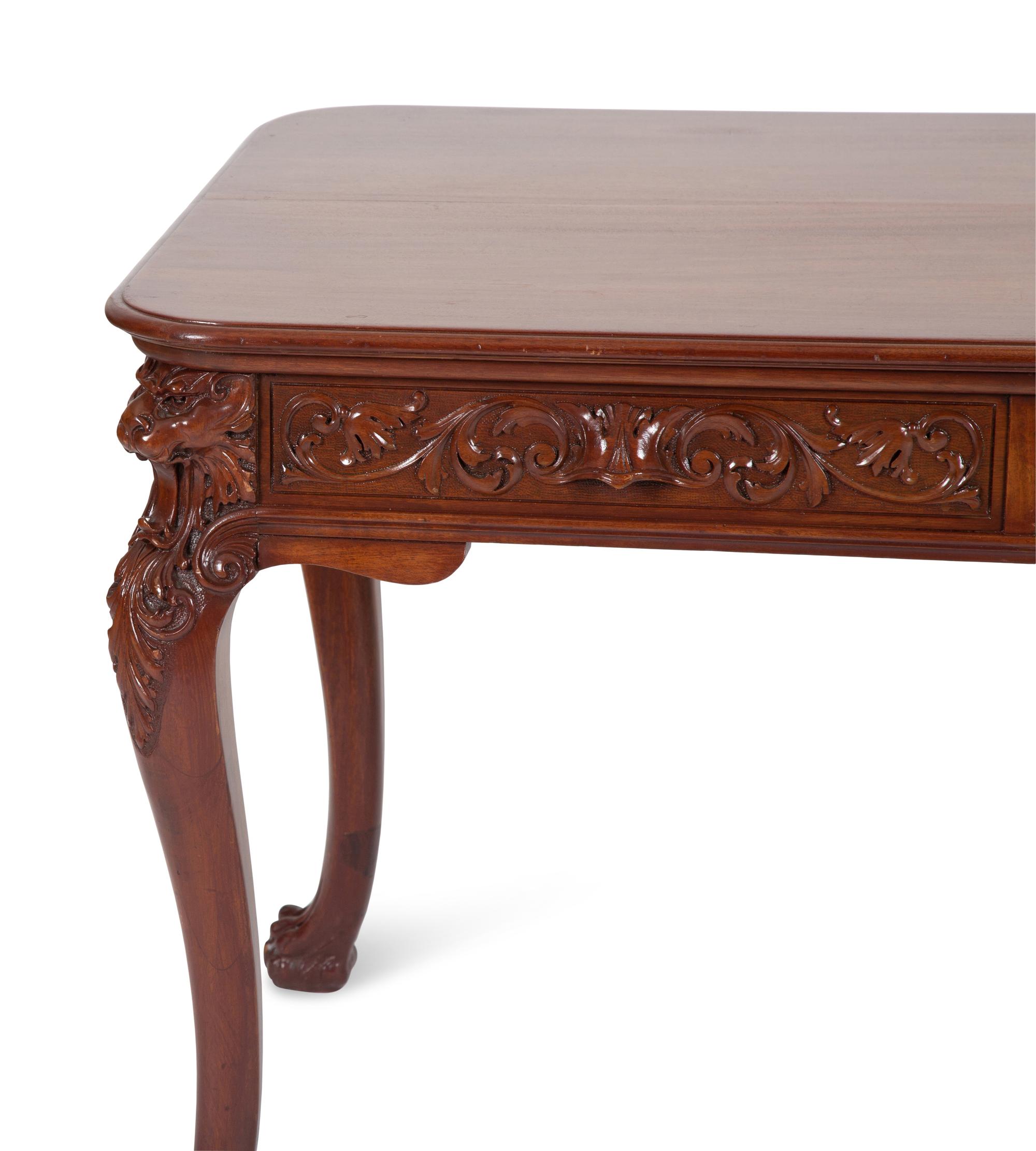 A Georgian Style Carved Mahogany Writing Table