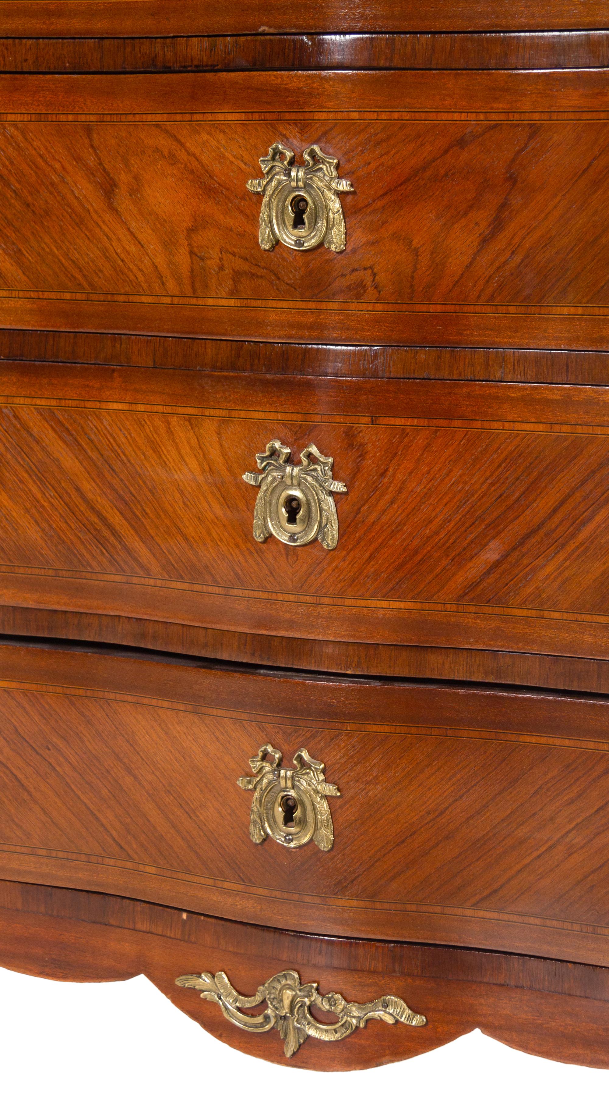 A Louis XV/XVI Transitional Style Gilt Bronze Mounted Marble-Top Commode
