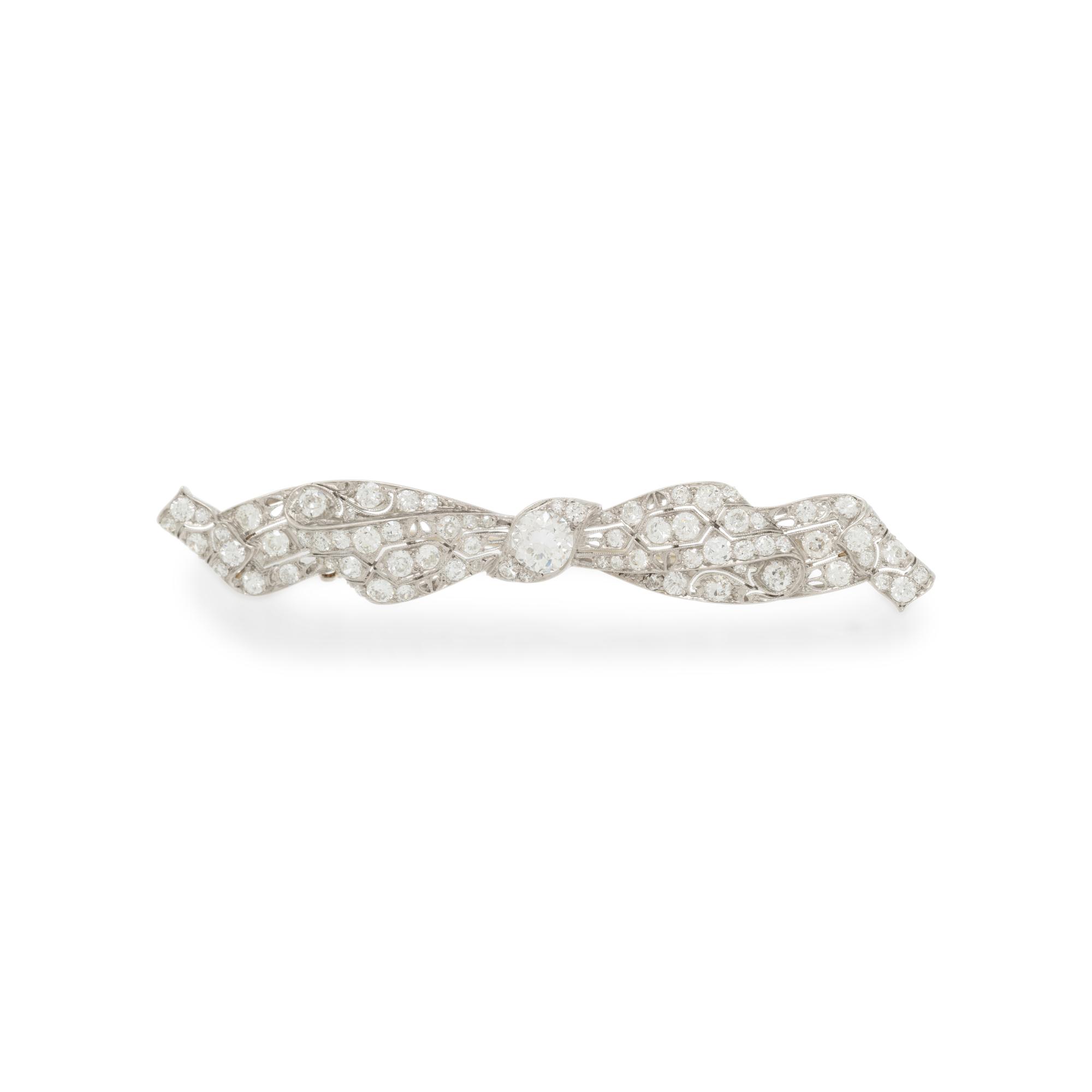 DIAMOND AND PLATINUM BOW BROOCH