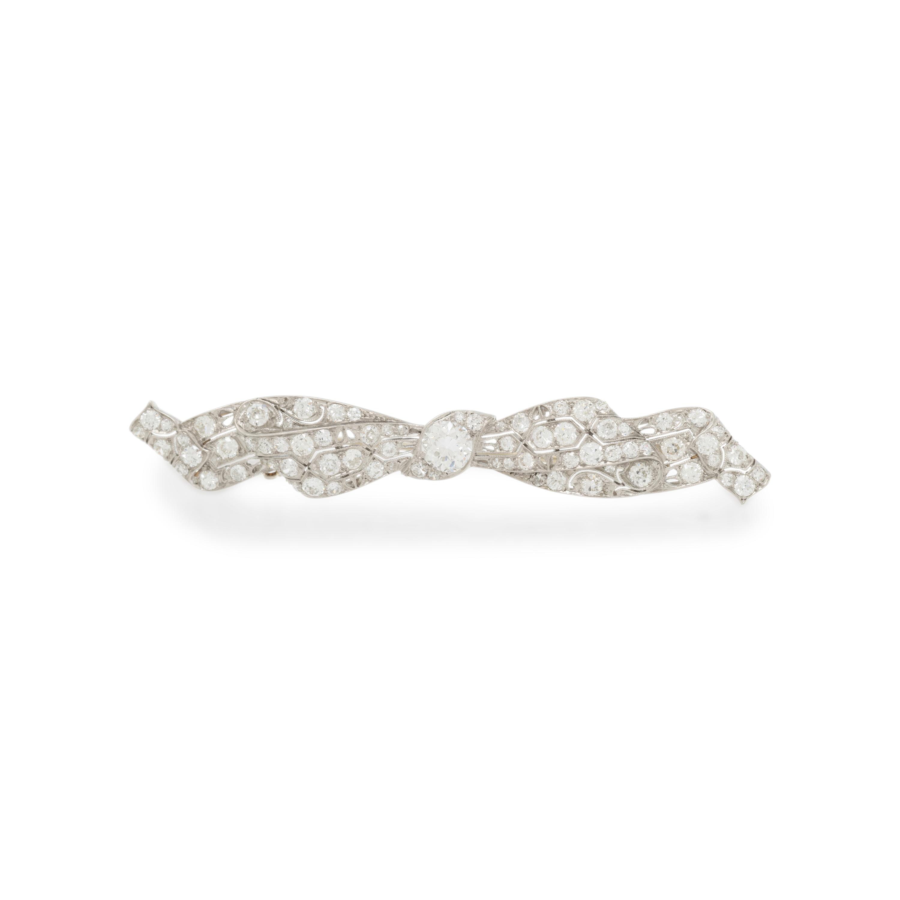 DIAMOND AND PLATINUM BOW BROOCH