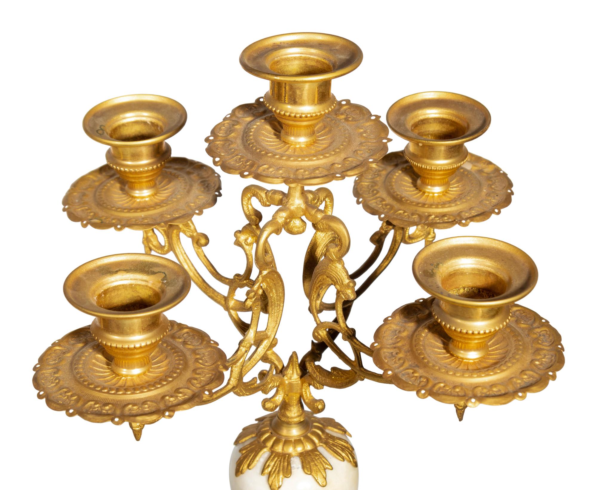 A Pair of Continental Gilt Bronze and Marble Five-Light Candelabra