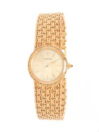 CORUM, YELLOW GOLD WATCH
