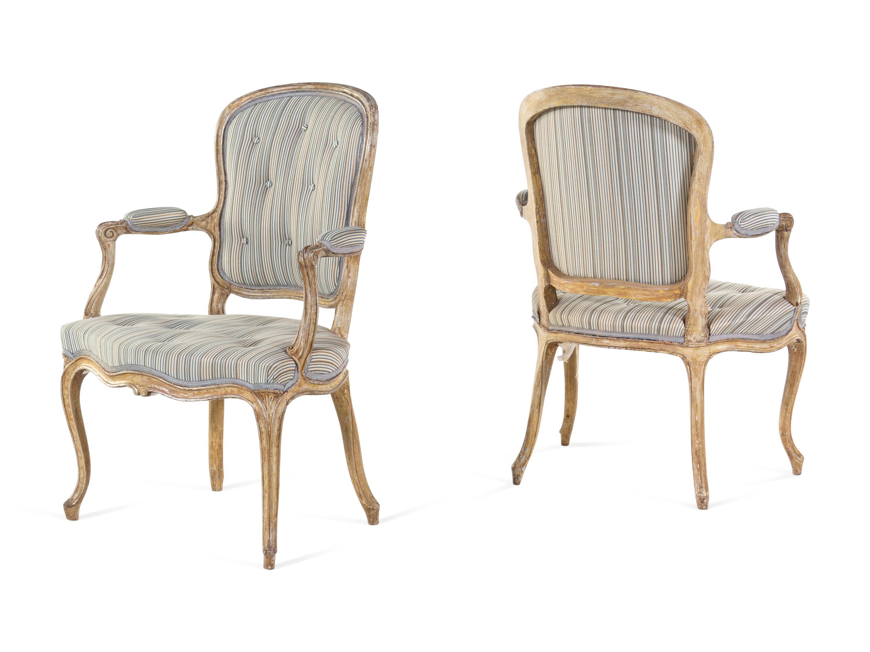 A Set of Six Louis XV Carved and Painted Fauteuils