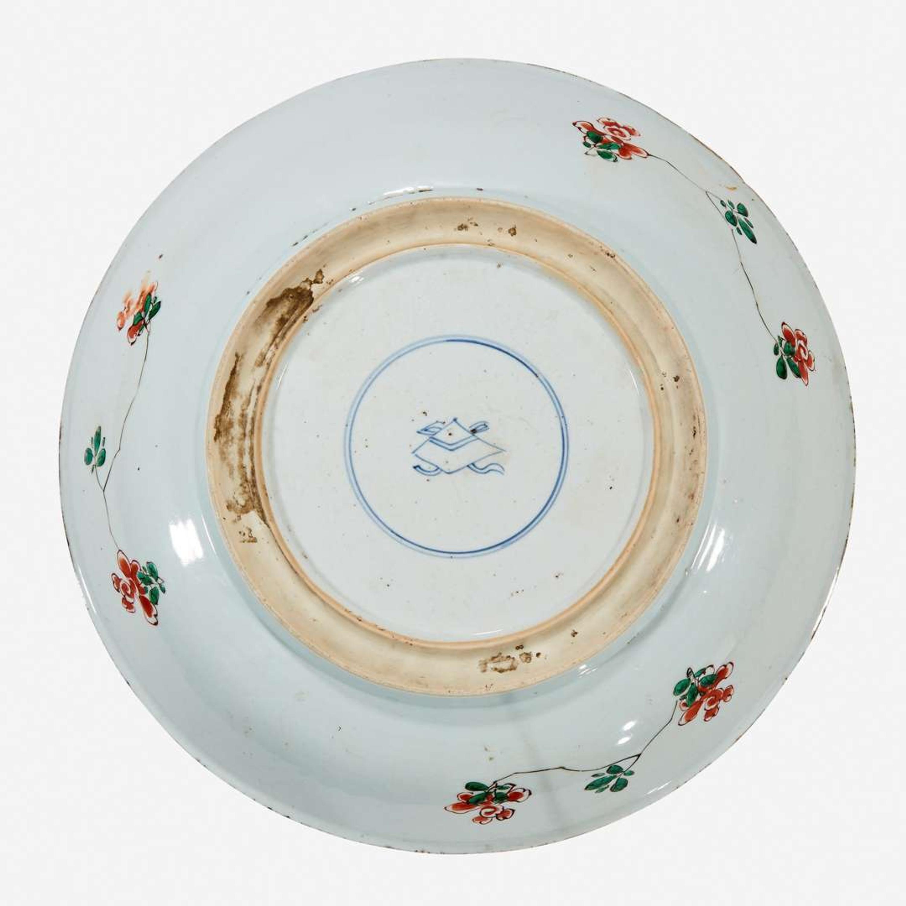 A Chinese famille verte-decorated porcelain "Flower Basket" charger Kangxi period