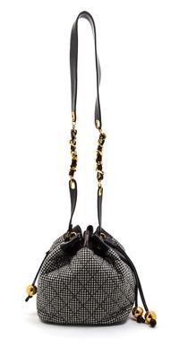 A Chanel Black and White Houndstooth Wool and Black Leather Trim Bucket Bag, 8 1/2 x 7 1/2 x 5 1/2 inches.