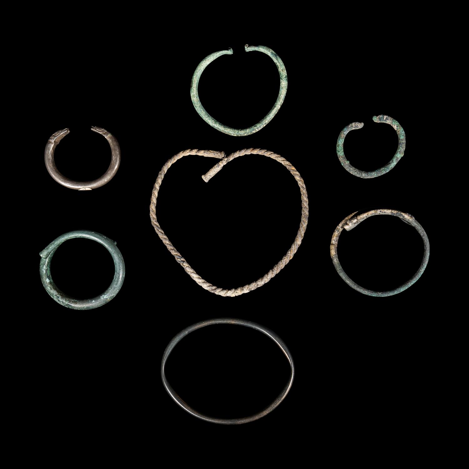 A Group of 7 European Bronze Age and Greek Bronze Jewelry