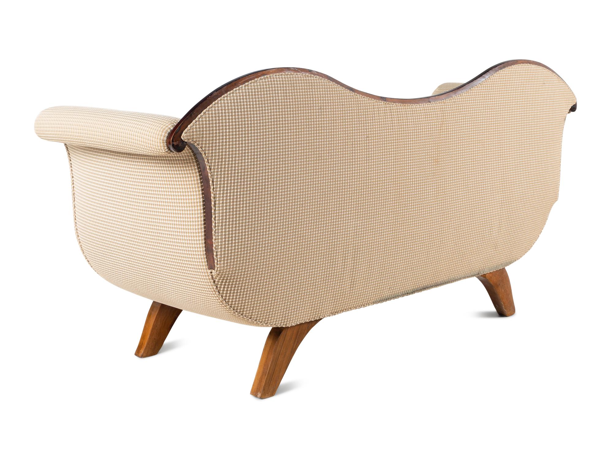 A Biedermeier Figured Walnut Sofa