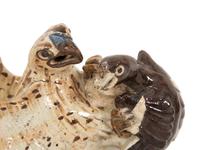 An Asian Provincial Kiln Glazed Ceramic Wall Pocket