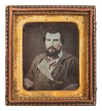 [EARLY PHOTOGRAPHY] -- [OCCUPATIONAL]. Sixth plate daguerreotype of a worker wearing a bib-front shirt.
