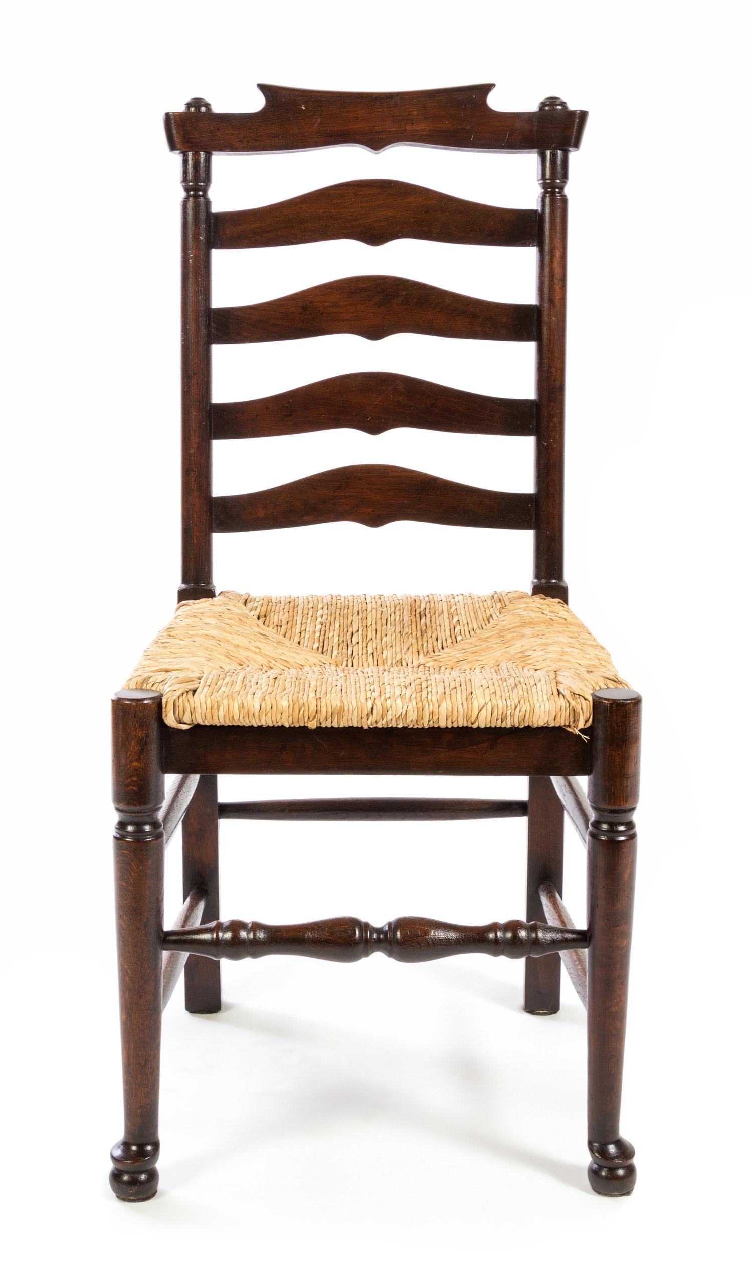 A Provincial Style Ladderback Side Chair Height 40 inches. — 20TH CENTURY