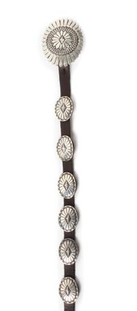 A James Reid Ltd., Santa Fe, NM, Silver and Leather Concha Belt Height of 2 1/4 x width 2 3/4, belt length 38 inches.