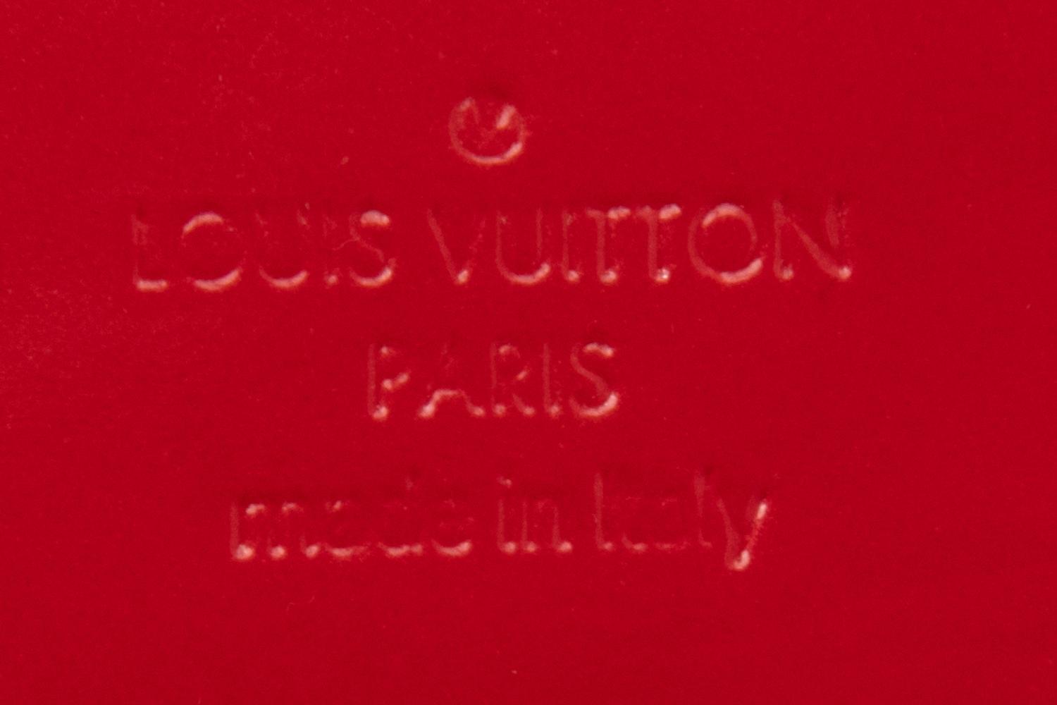 Louis Vuitton Sobe Clutch, 2012