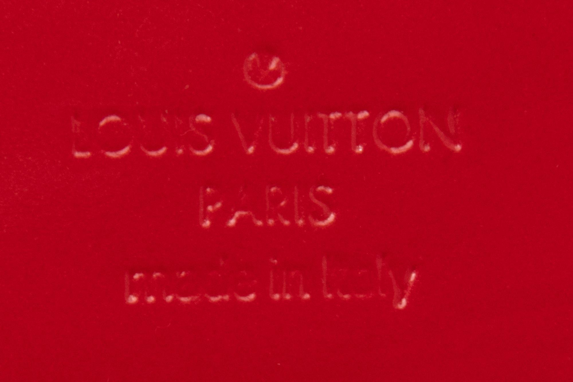 Louis Vuitton Sobe Clutch, 2012