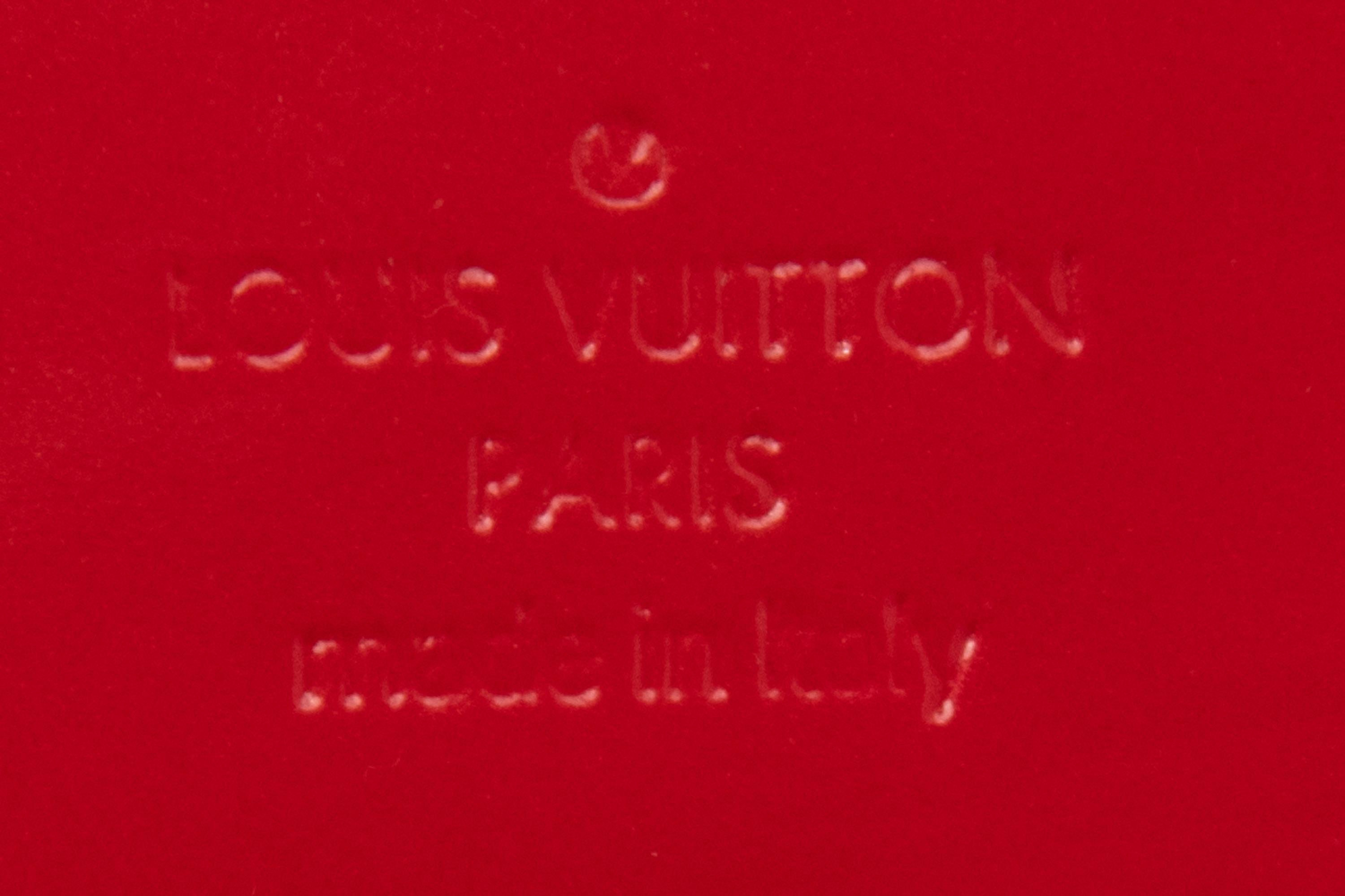 Louis Vuitton Sobe Clutch, 2012