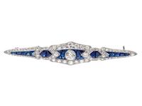 An Art Deco Platinum, Diamond and Sapphire Bar Brooch,