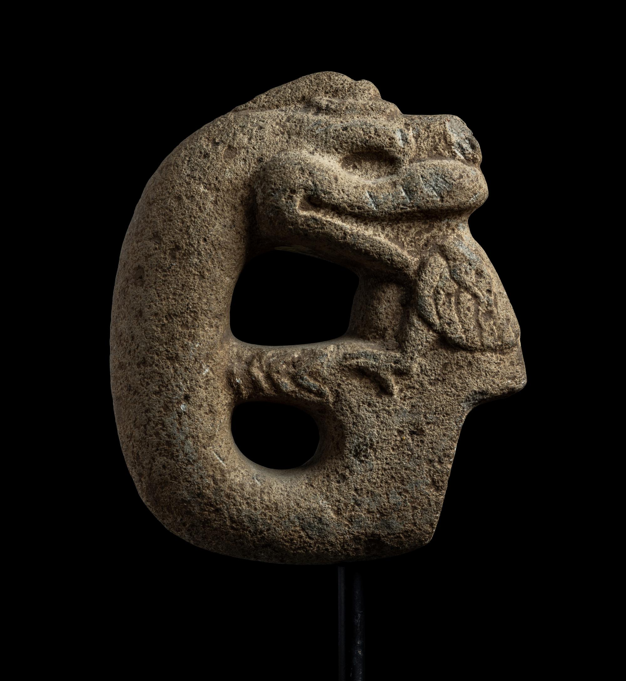 A Veracruz Stone Hacha in the Form of a Serpent Eating a Bird