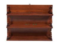 An English Mahogany Hanging Wall Shelf Height 22 1/4 inches.