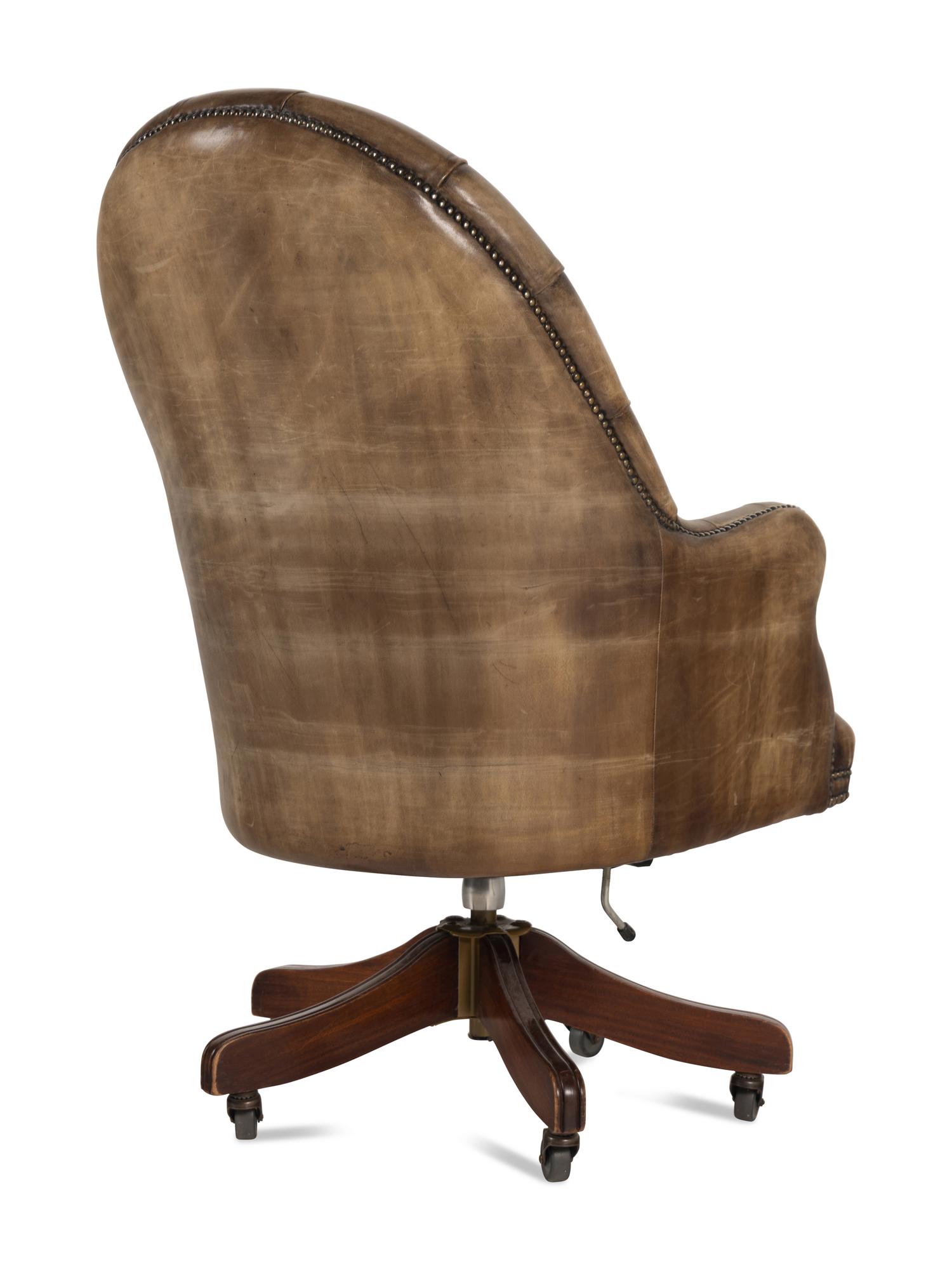 A Button-Tufted Leather Desk Chair