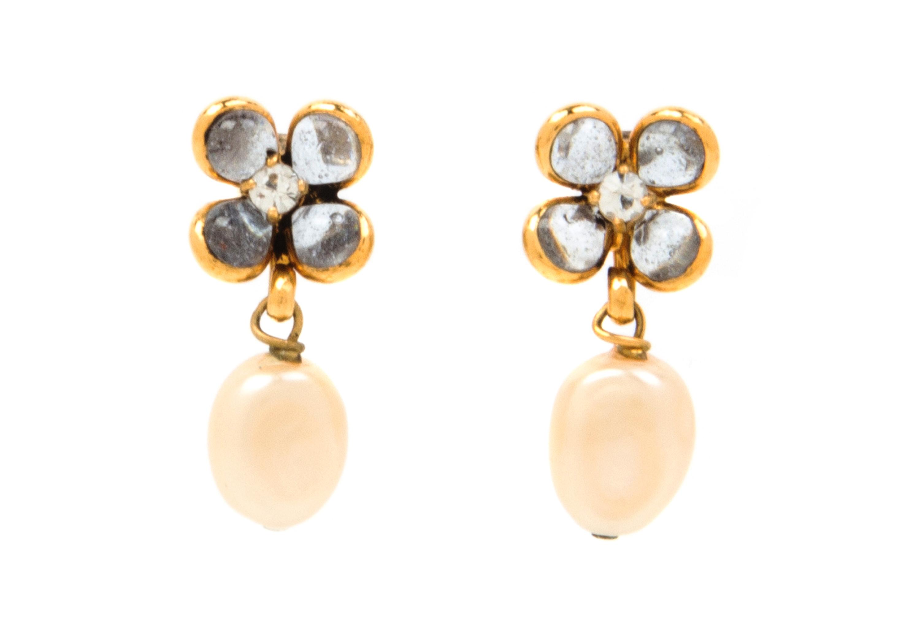 A Pair of Chanel Floral Earrings, 1" x .5".