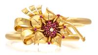 A Retro Yellow Gold, Ruby and Diamond Convertible Brooch/Bangle Bracelet, 21.60 dwts.