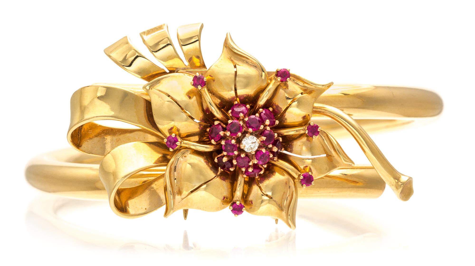 A Retro Yellow Gold, Ruby and Diamond Convertible Brooch/Bangle Bracelet, 21.60 dwts.