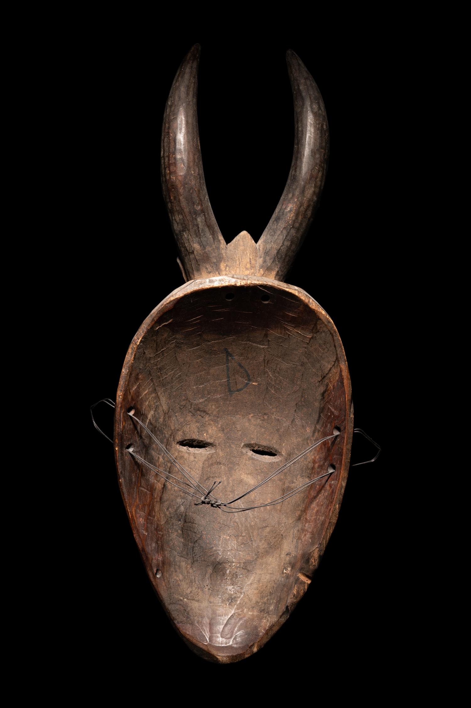 Two Baule Wood Masks