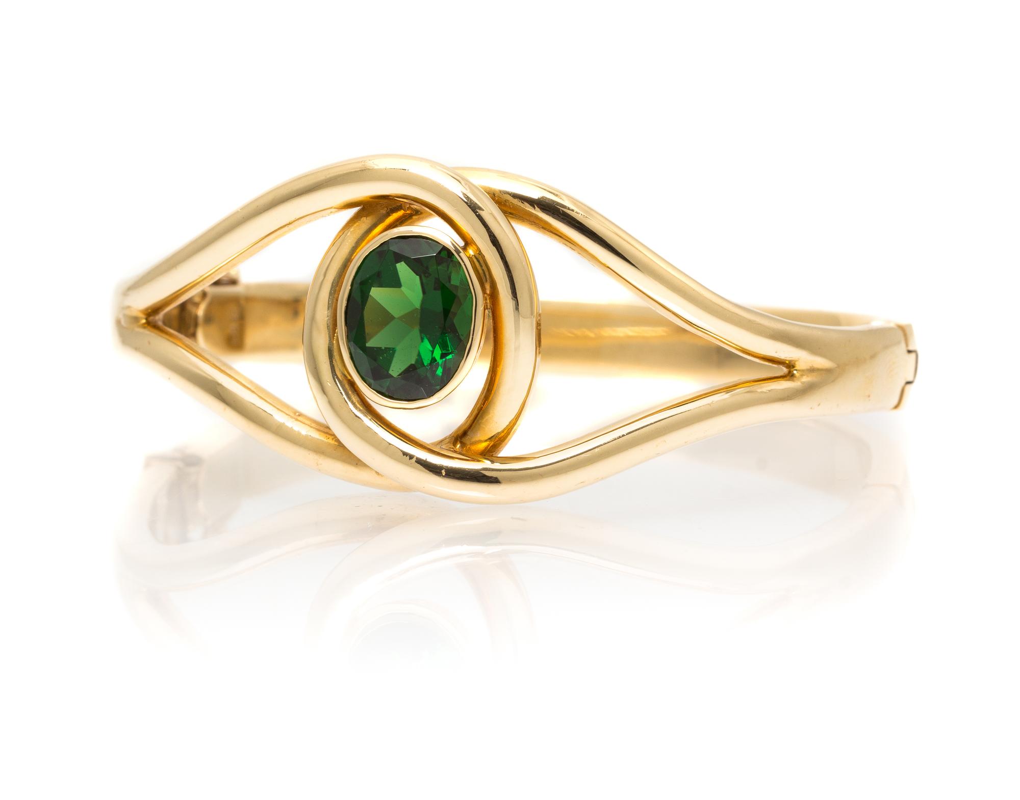 A 14 Karat Yellow Gold and Chrome Tourmaline Bangle, 40.40 dwts.