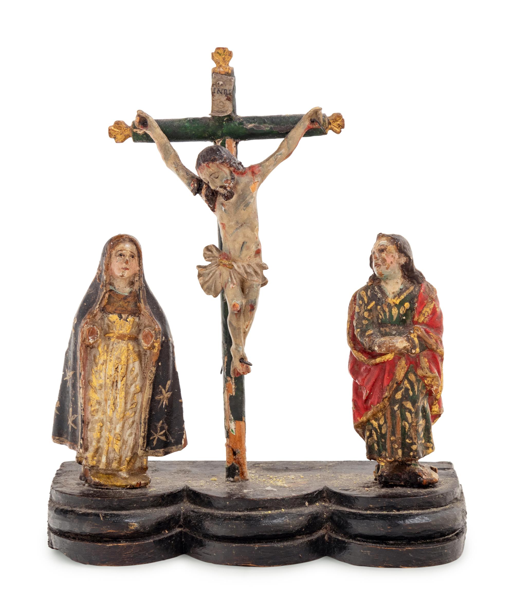 A Continental Carved and Polychrome Decorated Figural Group Depicting the Crucifixion