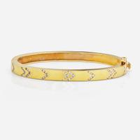 An 18K Yellow Gold and Diamond Bangle