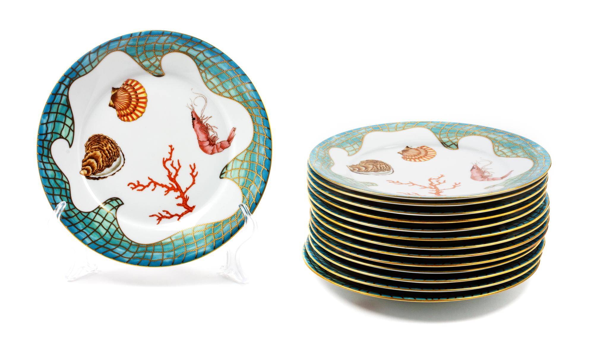 Fourteen Lynn Chase Porcelain Salad Plates Diameter: 8 3/4 inches.