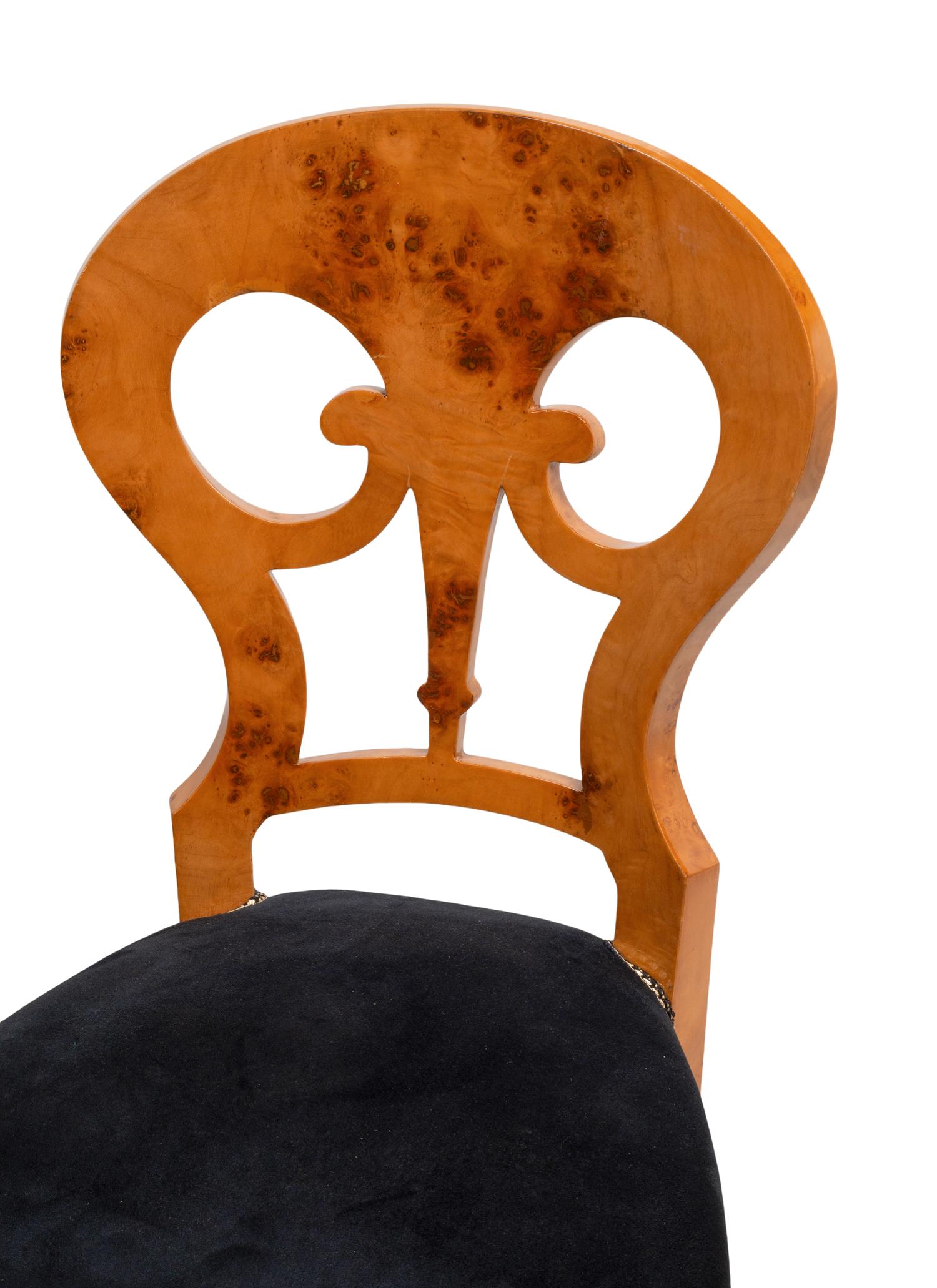 A Set of Twelve Biedermeier Style Burlwood Dining Chairs
