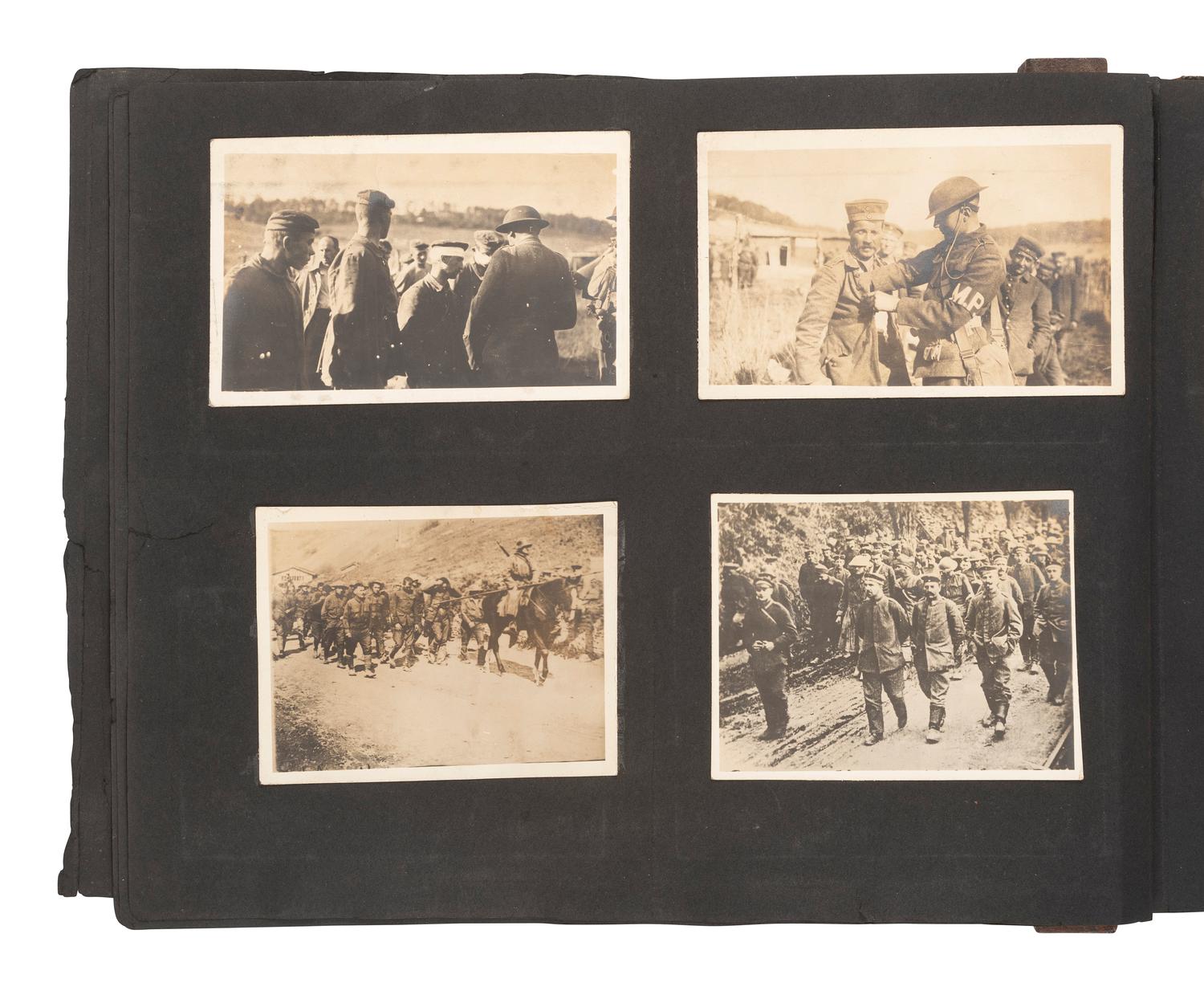 [WORLD WARS]. Archive featuring WWI photo album with scarce photographs from the Russian front.