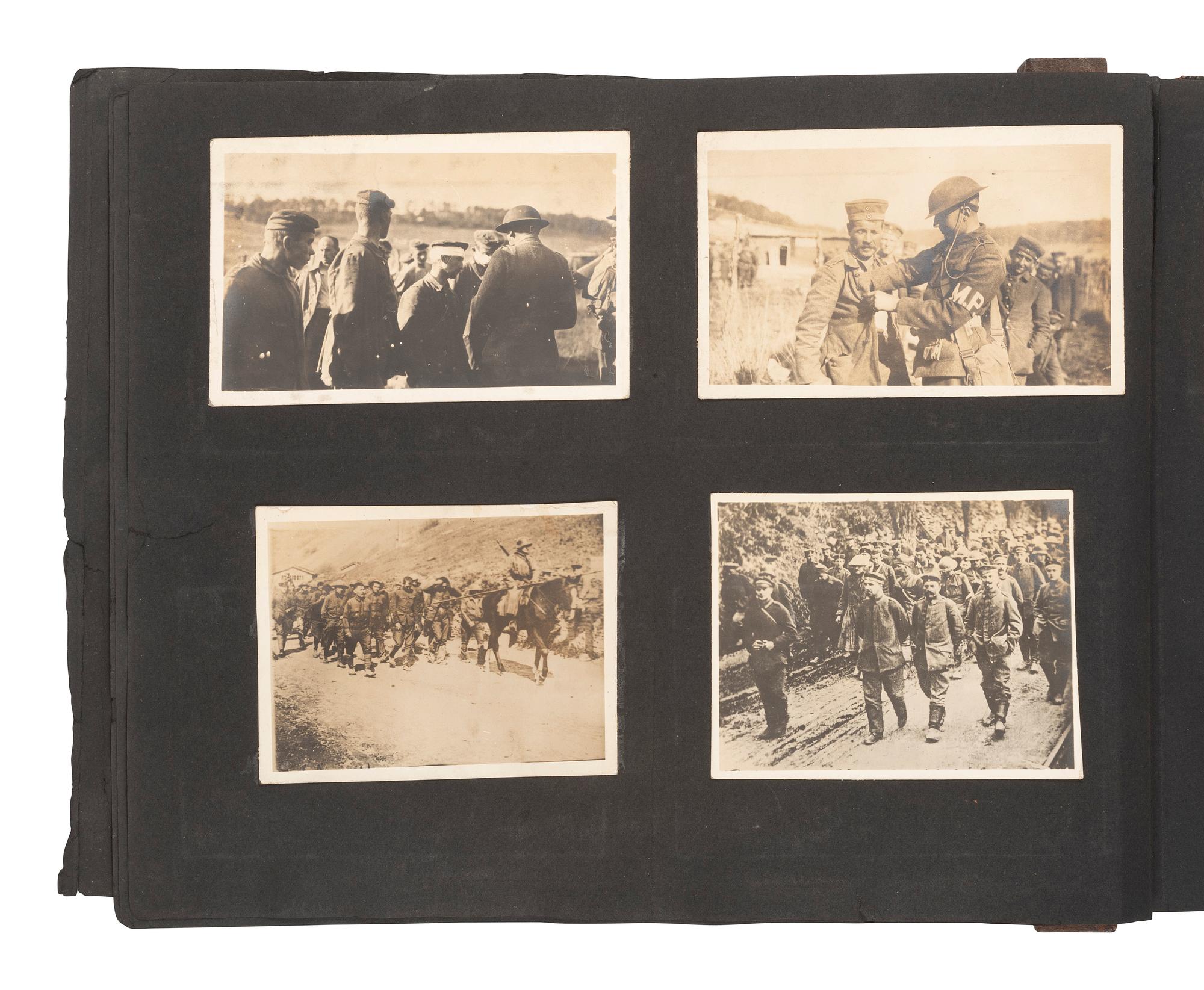[WORLD WARS]. Archive featuring WWI photo album with scarce photographs from the Russian front.
