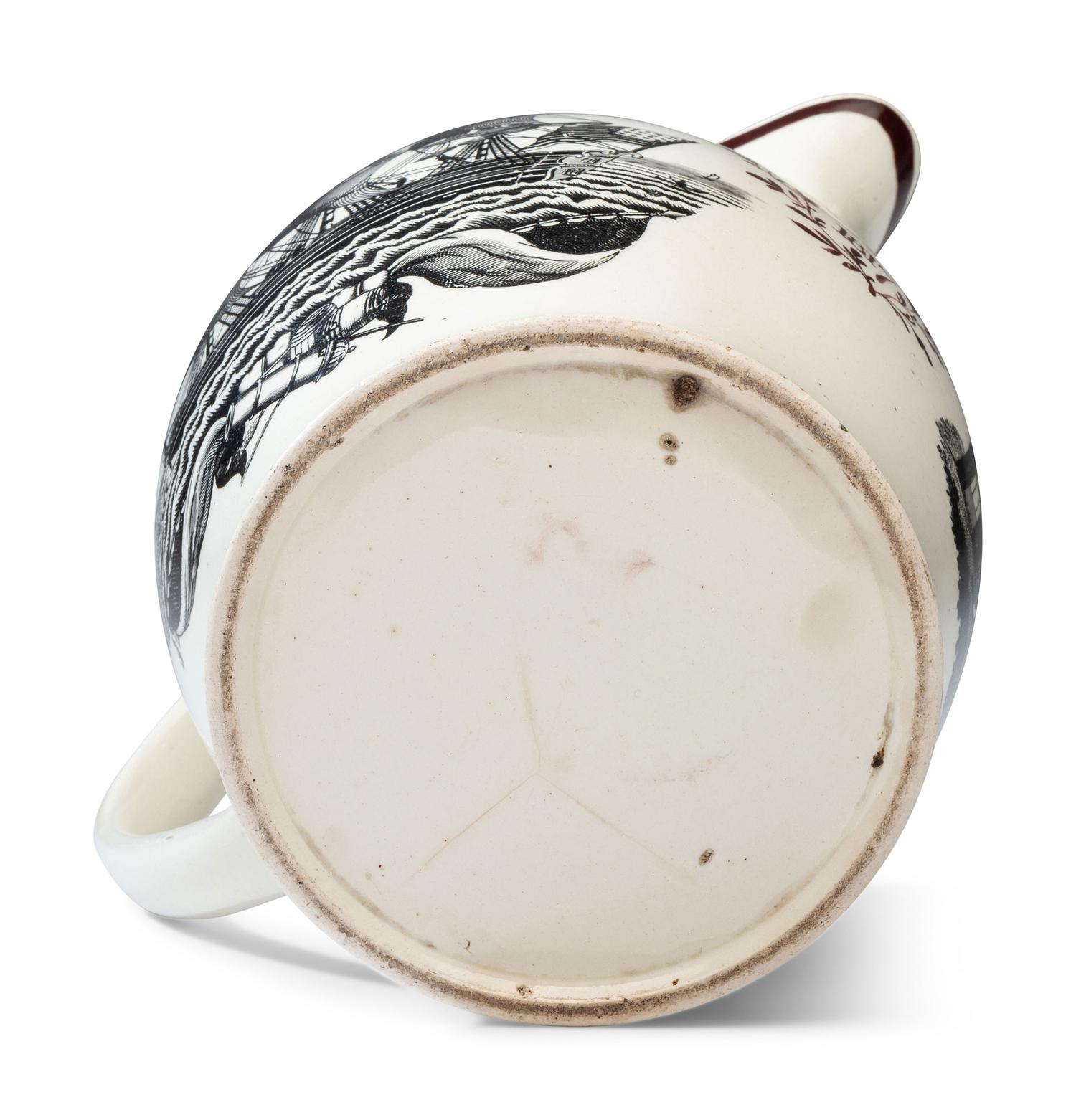 A Liverpool Creamware 'Farmer's Arms' Portrait Pitcher